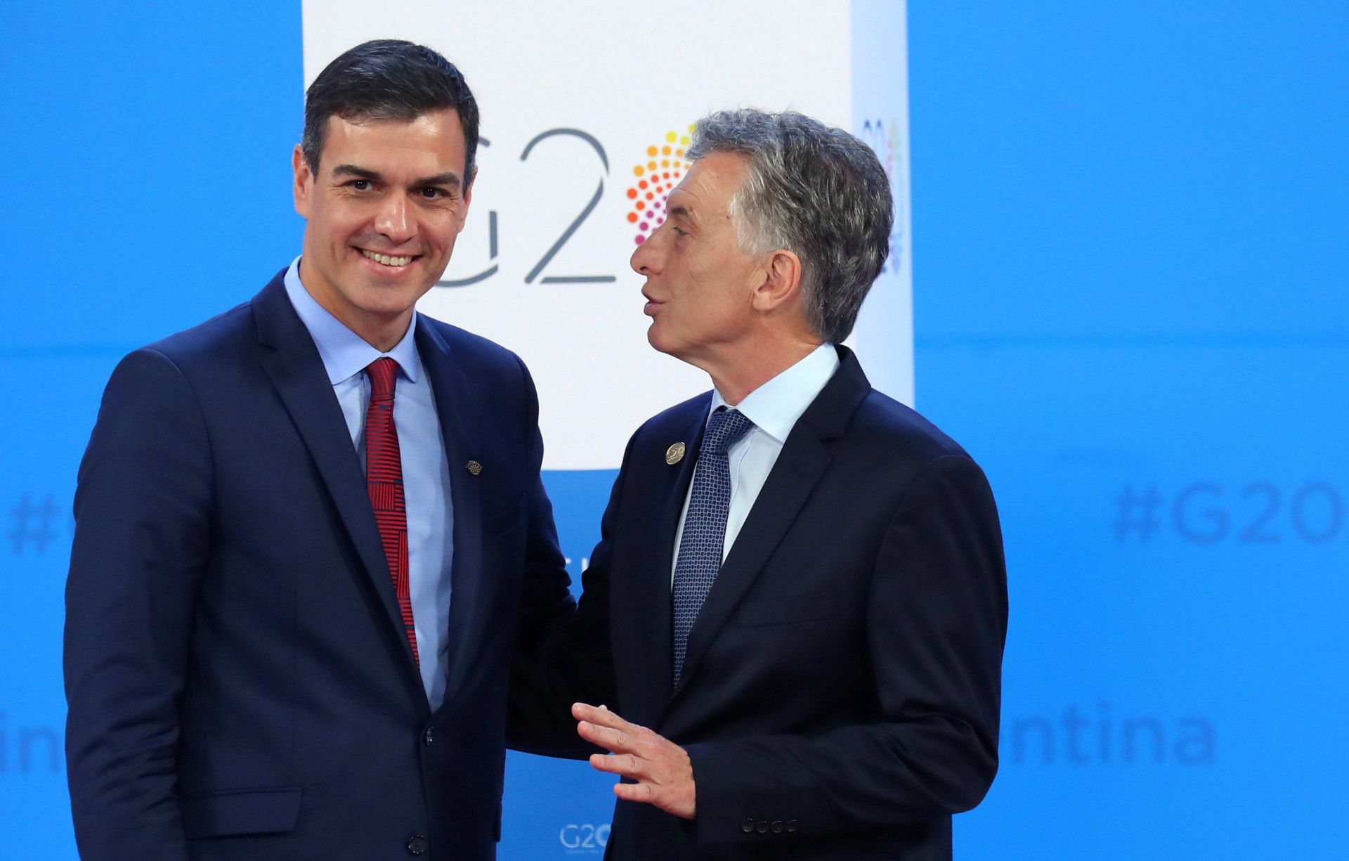 Spain's Prime Minister Pedro Sanchez is welcomed by Argentina's President Mauricio Macri as he arrives for the G20 leaders summit in Buenos Aires, Argentina November 30, 2018. REUTERS/Marcos Brindicci