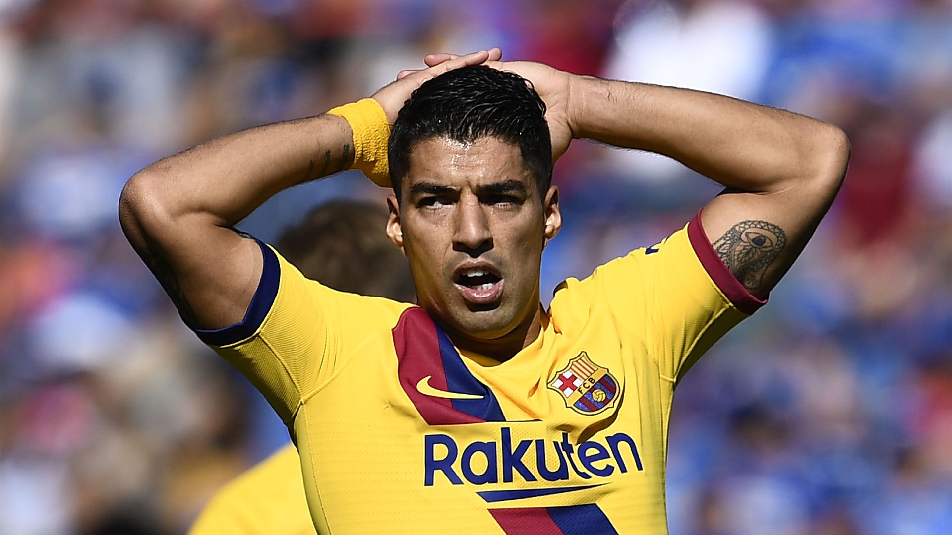 Barcelona's Uruguayan forward Luis Suarez reacts after missing a goal opportunity during the Spanish league football match between Getafe CF and FC Barcelona at the Col. Alfonso Perez stadium in Getafe on September 28, 2019. (Photo by OSCAR DEL POZO / AFP)