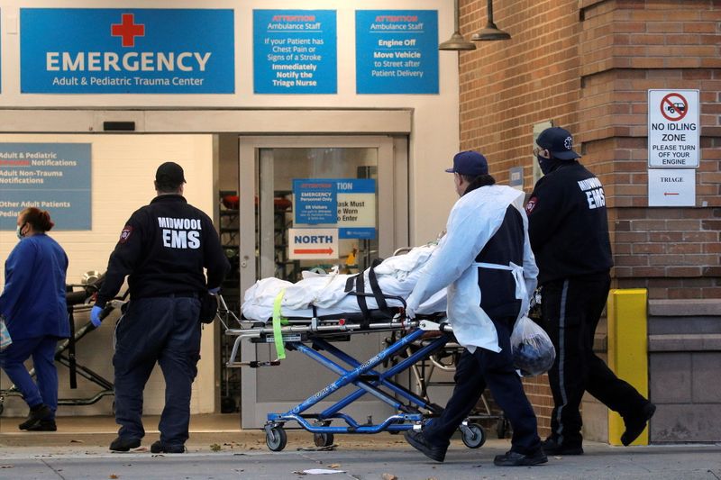 FILE PHOTO: A patient arrives outside Maimonides Medical Center, as the spread of the coronavirus disease (COVID-19) continues, in Brooklyn, New York, U.S., November 17, 2020. REUTERS/Brendan McDermid
