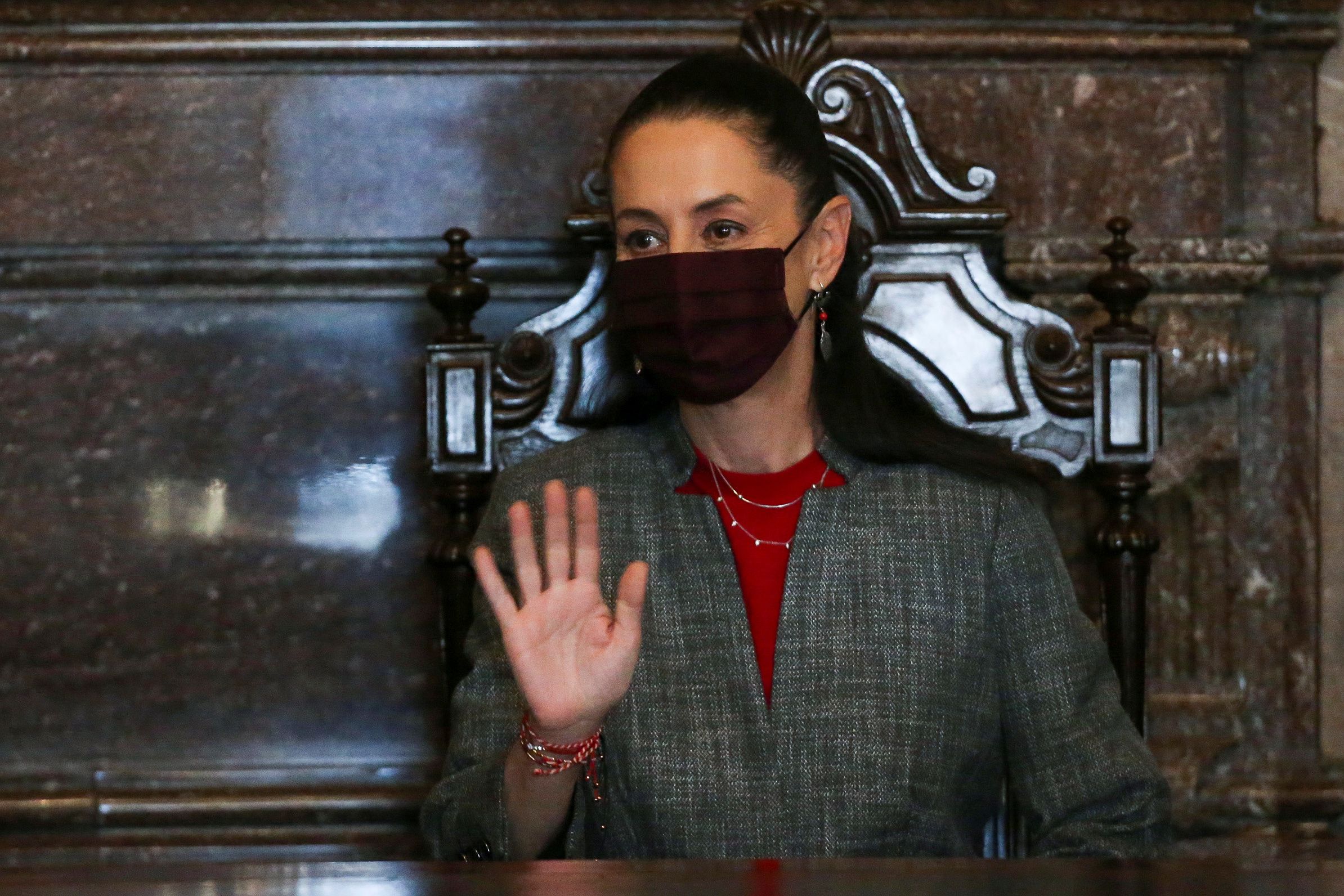 Mexico City Mayor Claudia Sheinbaum waves during a ceremony to deliver a Distinguished Guest recognition to Vatican Secretary of State Cardinal Pietro Parolin at the City Hall in Mexico City, Mexico June 21, 2021. REUTERS/Edgard Garrido