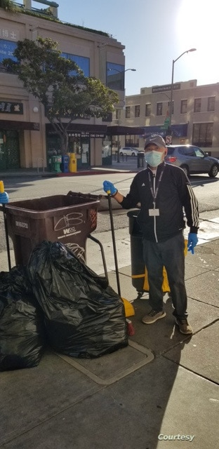 Lam Hong Le volunteers to clean the streets in Oakland Chinatown, California. (Courtesy Photo - Tsuru for Solidarity) 