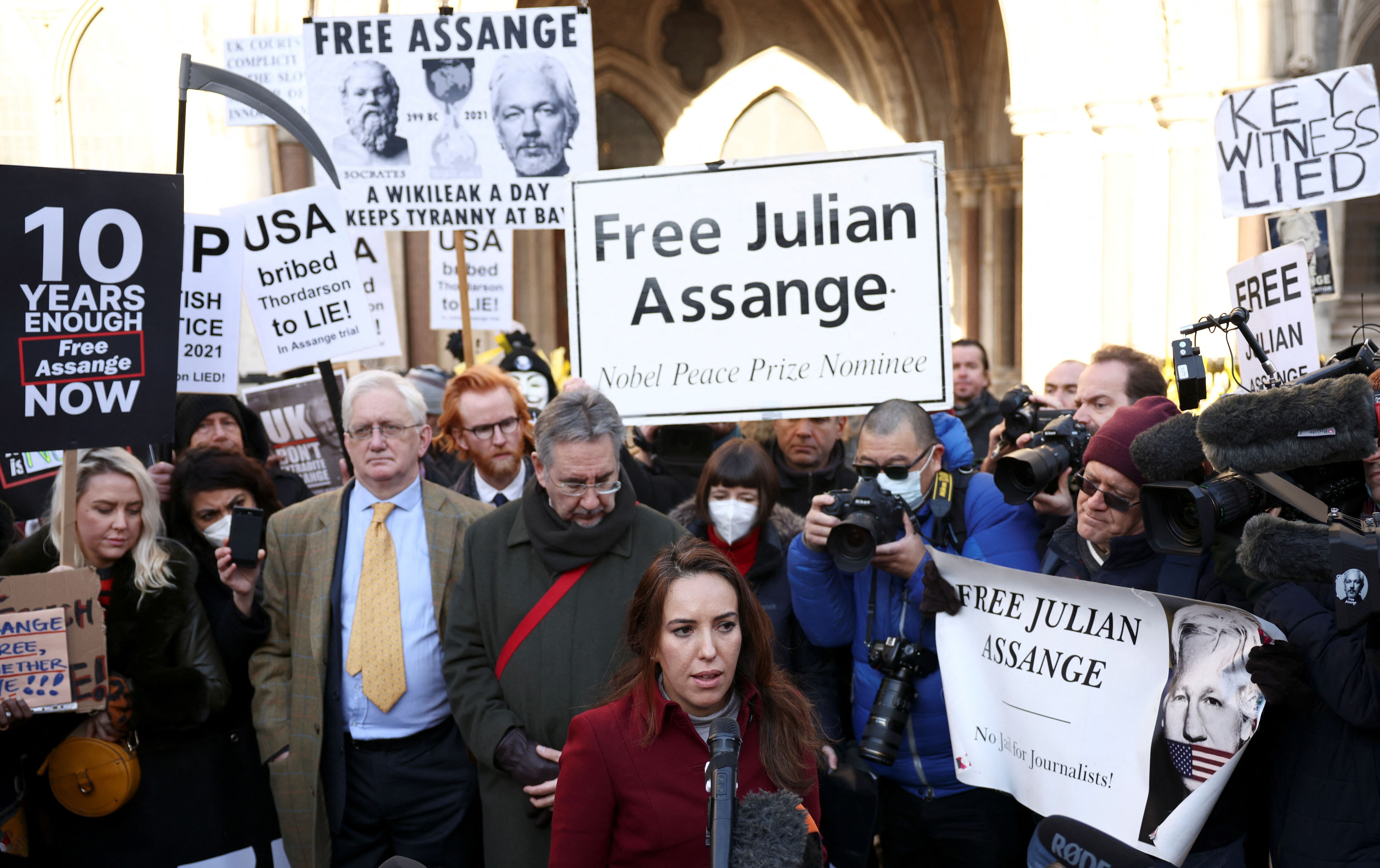 Stella Morris, partner of Wikileaks founder Julian Assange, speaks to media outside the Royal Courts of Justice following the appeal against Assange's extradition in London, Britain December 10, 2021. REUTERS/Henry Nicholls