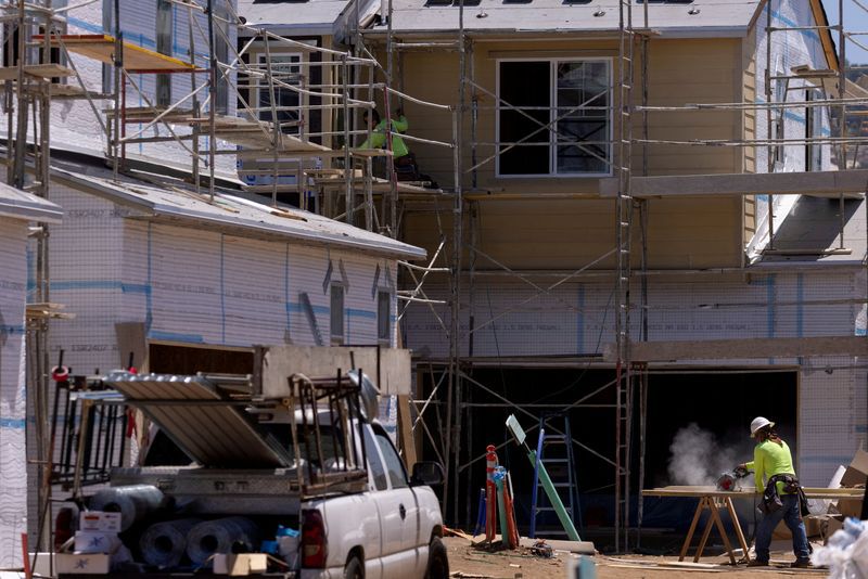 FILE PHOTO: Residential single family homes construction by KB Home are shown under construction in the community of Valley Center, California, U.S. June 3, 2021. REUTERS/Mike Blake