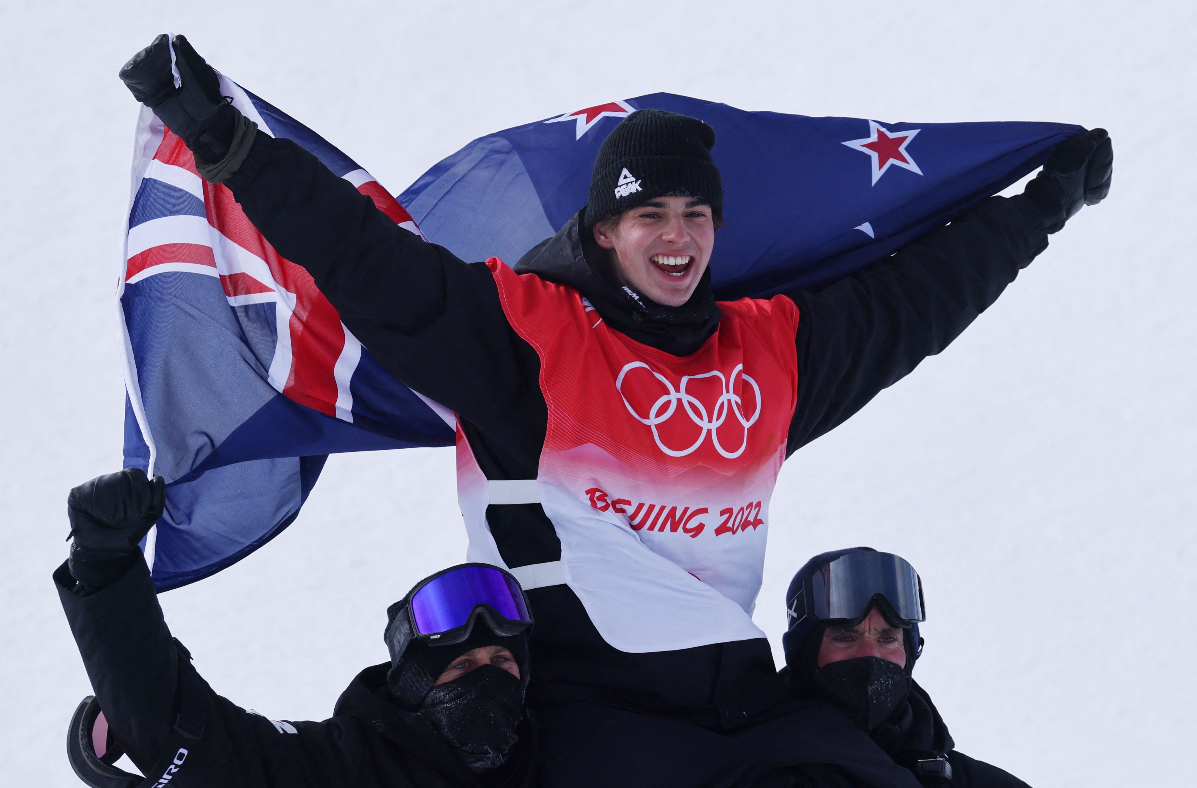 2022 Beijing Olympics - Freestyle Skiing - Men's Freeski - Halfpipe - Final - Run 3 - Genting Snow Park, Zhangjiakou, China - February 19, 2022. Gold medallist Nico Porteous of New Zealand celebrates after the event. REUTERS/Mike Blake