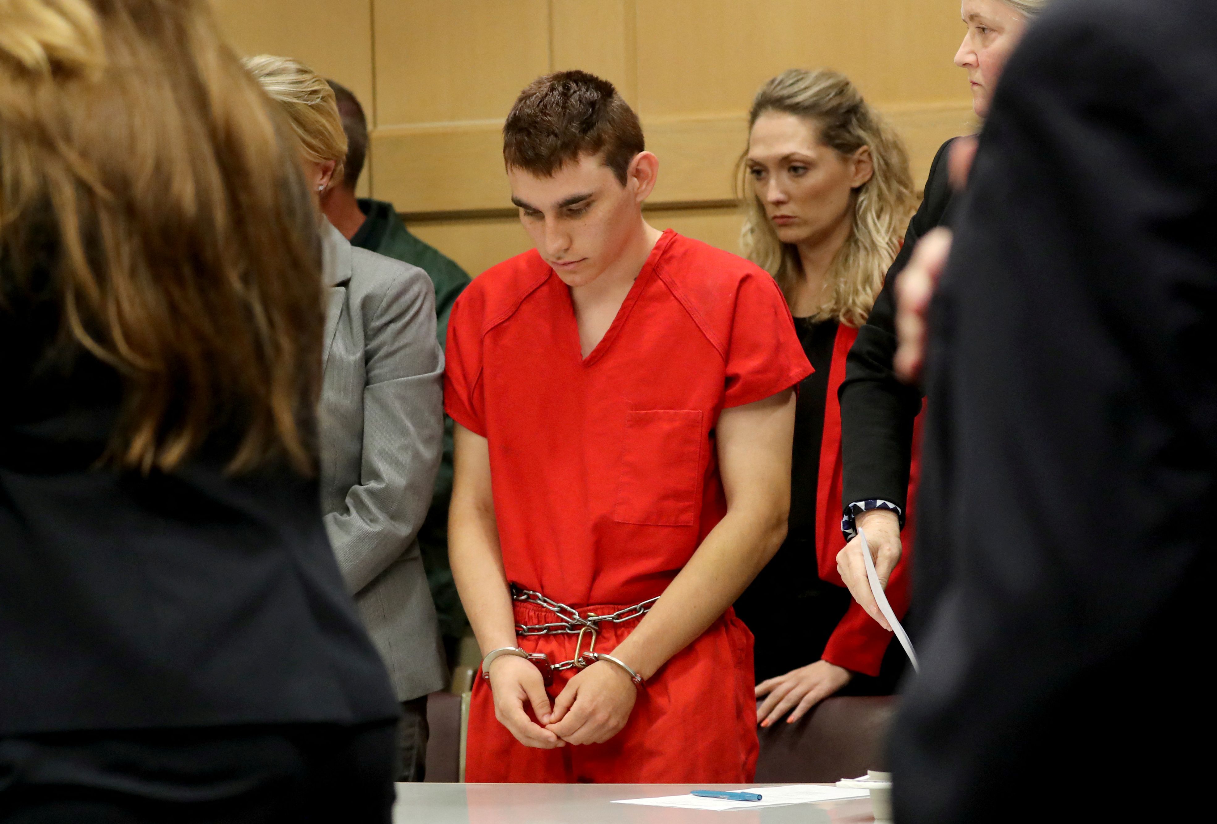 FILE PHOTO: Nikolas Cruz, facing 17 charges of premeditated murder in the mass shooting at Marjory Stoneman Douglas High School in Parkland, appears in court for a status hearing in Fort Lauderdale, Florida, U.S. February 19, 2018. REUTERS/Mike Stocker/Pool/File Photo