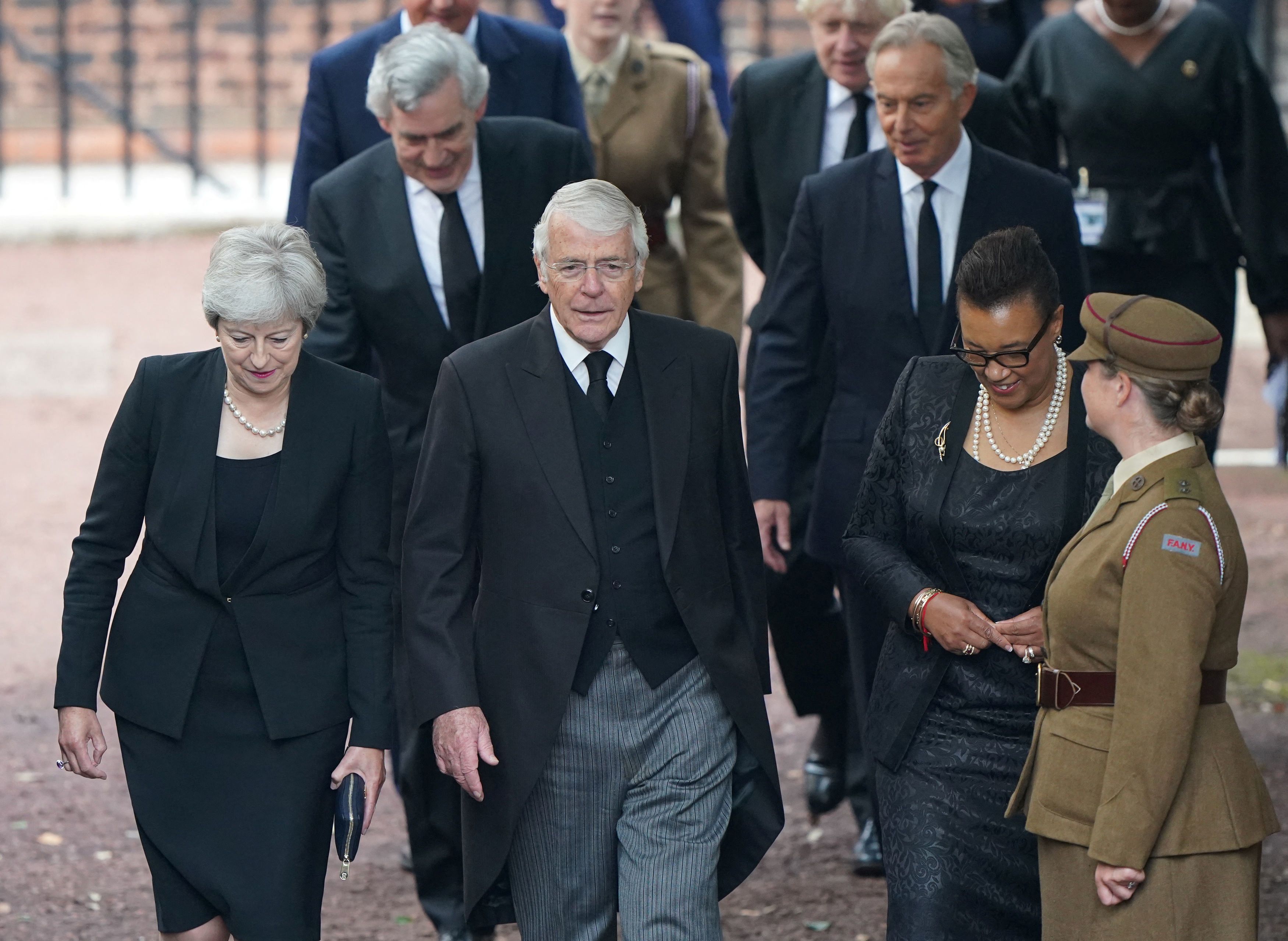 Former British Prime Ministers Theresa May, John Major, and Baroness Scotland arrive for the Accession Council ceremony at St James's Palace, where Britain's King Charles III will be proclaimed Britain's new monarch, following the death of Queen Elizabeth II, in London, Britain September 10, 2022. Joe Giddens/Pool via REUTERS