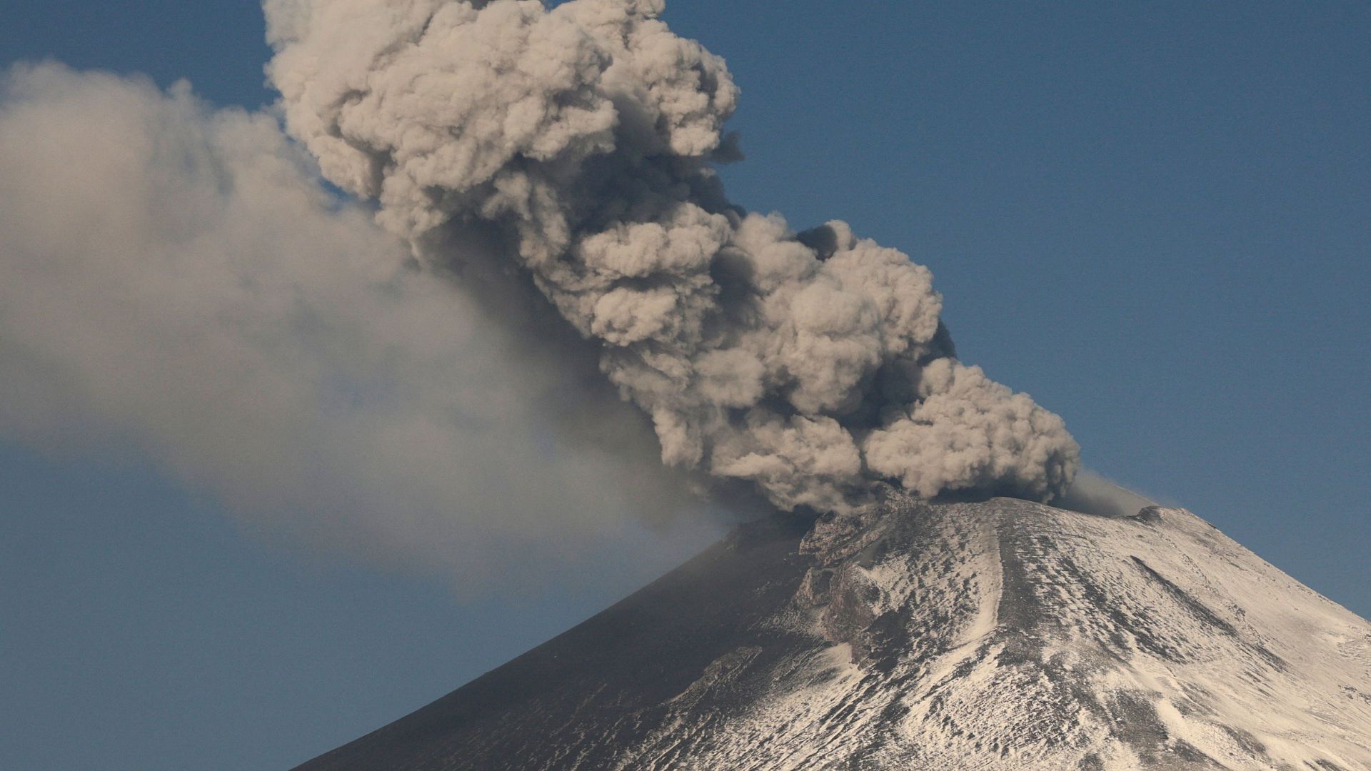 Steam and ashes emerge from the Popocatepetl volcano, after an increase in volcanic activity, as seen from the town of Santiago Xalizintla, Mexico May 12, 2023